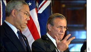 Colin Powell (l) and Donald Rumsfeld