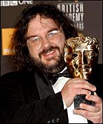 Peter Jackson receives his Oscar for Best Director