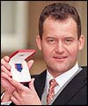 Burrell with his Royal Victorian Medal
