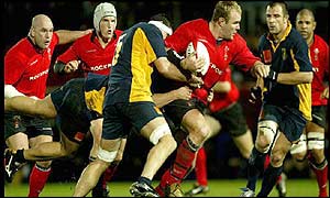 Wales number eight Scott Quinnell leads a Welsh charge in a frantic start to the second half