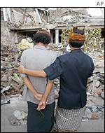 Indonesian men at the Bali bomb site