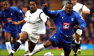 Birmingham's Stern John (right) and Bolton's Jay-Jay Okocha 