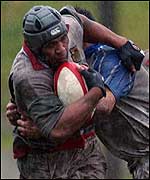 Ebbw Vale's Kati Tuipulotu is caught by Shawn Van Rensberg