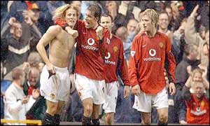 Shirtless Diego Forlan leads Man Utd's victory celebrations