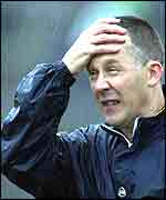 Crossmaglen boss Oliver Short watches in disbelief as he side tosses away a big lead