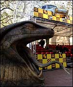 A giant snake's head and flying car at the Harry Potter premiere