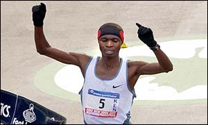 Rop crosses the line first ahead of fellow Kenyans Christopher Cheboiboch and Laban Kipkemboi 