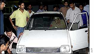 Delhi police checking a car following the militant's killing