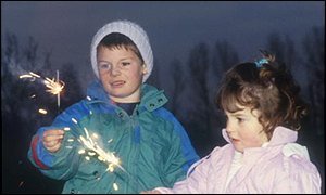 Children play with sparklers