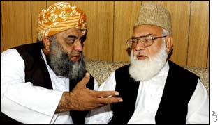 Maulana Fazlur Rehman (L) and Qazi Hussain Ahmed (R) meeting in Islamabad
