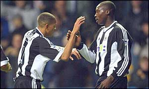 Jermaine Jenas and Shola Ameobi celebrate Newcastle's first goal