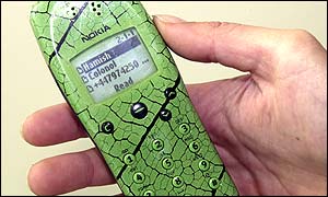 A mobile phone about to send a text message