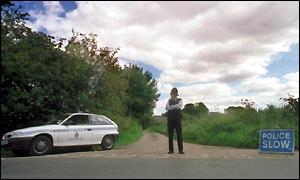 Police officer in rural area