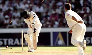 Darren Gough dismisses Stuart MacGill on his way to becoming the first Englishman to claim an Ashes hat-trick since 1899