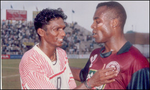 Chima is congratulated by Vijan after a league game 
