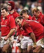 Wales players hang their heads after a heavy defeat last year