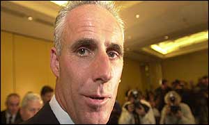 McCarthy faces the media glare as he confirms his resignation