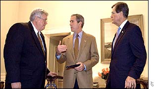 President George W Bush with House Speaker Dennis Hastert (l) and Senate Republican leader Trent Lott