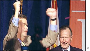 Florida Governor Jeb Bush celebrates with his father
