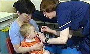 Child being given an injection