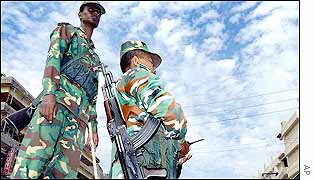 Bangladeshi troops cordon off a Dhaka street