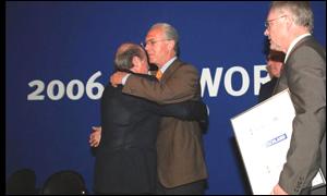 Germany's Franz Beckenbauer hugs Fifa boss Sepp Blatter after winning the bid
