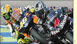 Alex Barros (right) duels with Valentino Rossi on his way to winning the 2002 Spanish MotoGP