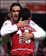 Arsenal's Robert Pires celebrates scoring the opener