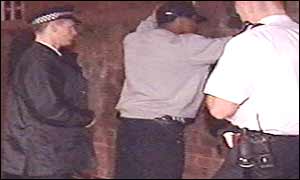 Police searching a suspect