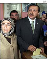 Erdogan with wife at polling station