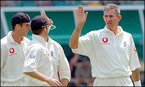 England bowler Andy Caddick celebrates his wicket