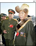 Tibetan delegate (right) arrives at the Great Hall of the People