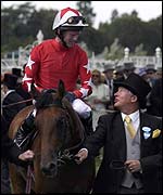 Mick Kinane on Rock of Gibraltar is congratulated by co-owner Sir Alex Ferguson after winning at Royal Ascot