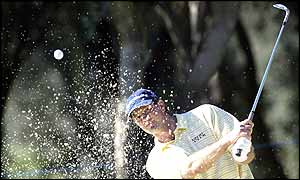 Retief Goose plays a shot out of a bunker in the Volvo Masters