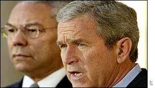 Secretary of State Colin Powell and President Bush after the UN vote