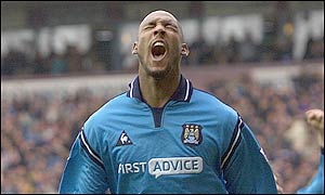 Manchester City's Nicolas Anelka celebrates putting the home side ahead against Manchester United