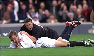 Jonny Wilkinson goes over to score England's second try
