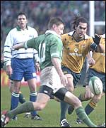 Australia's George Smith attempts to break down an O'Gara kick