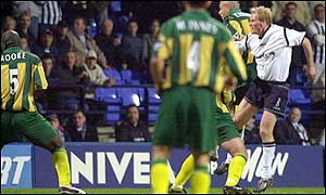 Per Frandsen jumps to net Bolton's equaliser against West Brom in the 88th minute