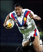 Great Britain's Leon Pryce is challenged