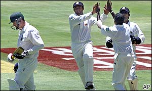 South African opening batsman Graeme Smith trudges off the pitch after being caught by Sri Lanka's Hashan Tillakaratne for 78
