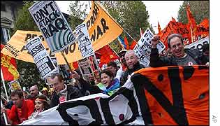 Demonstrators run down the road during the demonstration