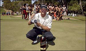 Goosen poses with his trophy after winning the Johnnie Walker Classic in Australia
