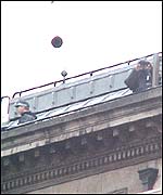 Police keep a look out on the rooftops