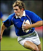 France's Cedric Heymans on his way to a try against South Africa