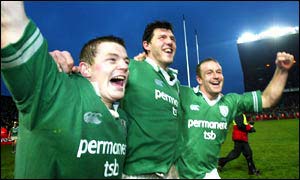 Brian O'Driscoll celebrates with Shane Horgan and Denis Hickie