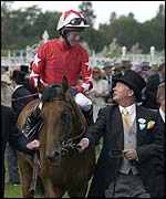 Sir Alex Ferguson guides Rock of Gibraltar into the winner's enclosure at Royal Ascot