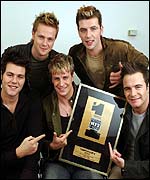 Westlife celebrating their number one single
