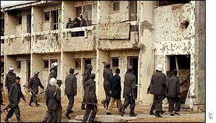 Police entering a Kabul University building
