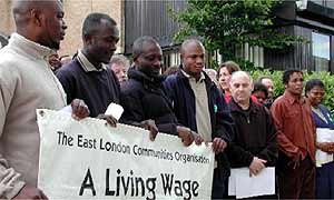 A group of workers protecting at low pay